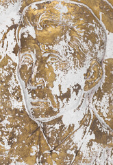 old weathered portrait of a man on plaster