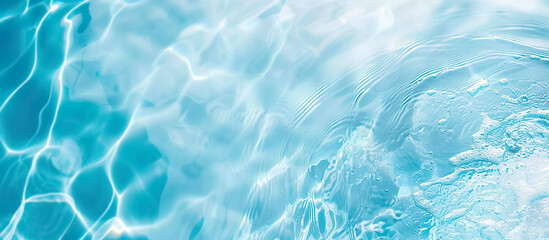 Blue water surface texture of swimming pool background.for design wallpaper