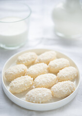 Homemade coconut candies in a plate.