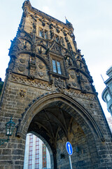 Sightseeing at the old town of Czech City of Prague with Powder Gate Tower on a sunny autumn day....