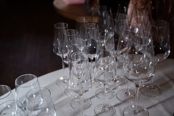 Glass glasses at an event. Catering and table setting for weddings and birthdays