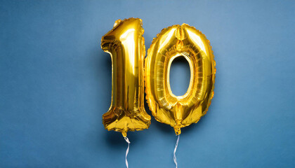 Banner with number 10 golden balloon. Ten year anniversary celebration. Bright blue background.