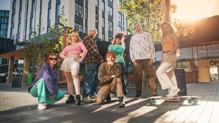 Vibrant Group Of Young Adults In Stylish Urban Wear Posing Confidently In A Sunlit Cityscape,...