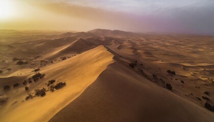 Fototapeta na wymiar aerial view of sand dunes at sunset in the sahara desert djanet algeria africa