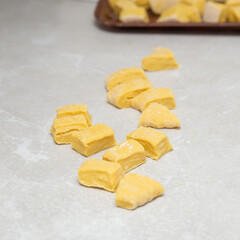 Homemade noodle dough at home. Close up, background, minimal concept.