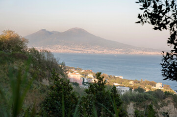 View of the gulf and Vesuvius volcano from the Posillipo district at sunset, Naples, Italy.