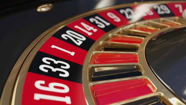 Roulette wheel close-up in a casino. A rotating roulette wheel with a ball on the number seven. Casino, gambling, betting. Cinematic shots close up. Seamless looping animation.