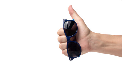 Hand with blue sunglasses isolated on white background.