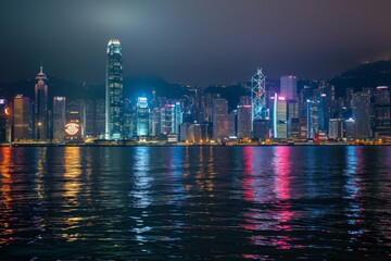 Hong Kong skyline from Victoria Harbor, View from across Victoria Harbor HongKong.,  AI generated