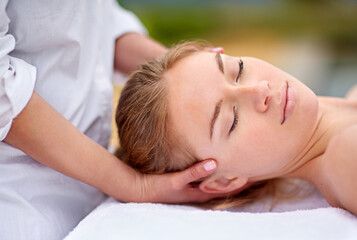 Woman, relax and spa with head massage for comfort with stress relief or physical therapy. Calm,...