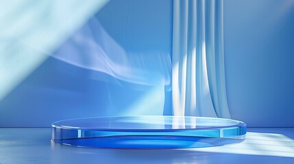 Blue translucent stage with white curtain and blue lighting.