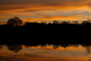 Fototapeta na wymiar Early Morning Sunrise Reflection