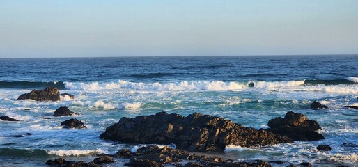 Waves breaking in sunlight