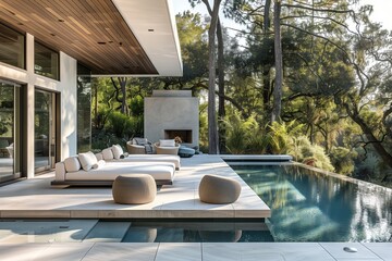Tranquil outdoor living space with modern furniture nestled beside a serene pool.