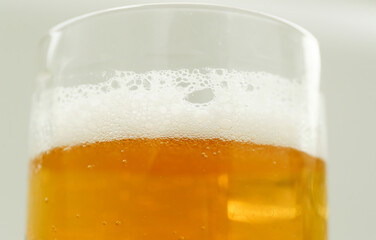 Light beer in a glass before consumption