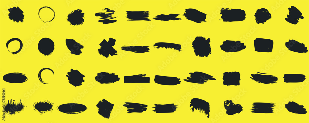 Wall mural abstract black brush strokes and shapes on a yellow canvas, featuring a variety of lines and forms, 