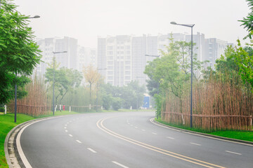 Road in the city district at morning.