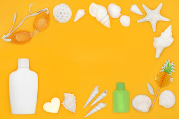 Seaside summer symbols and beach accessories with suntan lotion, swimming goggles and seashells. Travel holiday fun in the sun vacation concept on yellow background.