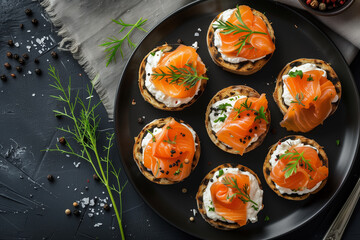 Top View Elegant Salmon Canapes. Top view of elegant salmon canapes on a dark plate, ideal for festive occasions.