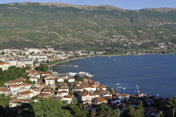 Fototapeta na wymiar View of city of Ohrid, which is famous for its UNESCO listed historical center and beautiful lake and small port.