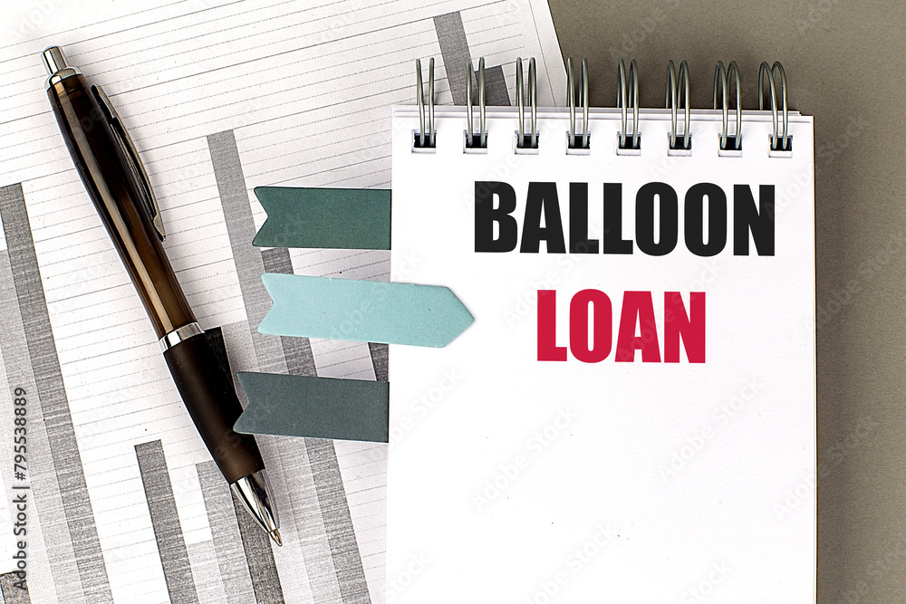 Poster balloon loan text on notebook with chart on gray background