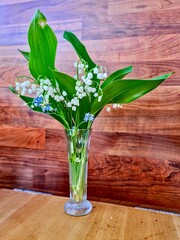 Spring's Fragrant Bouquet: A charming arrangement of lily-of-the-valley, with its sweetly scented...