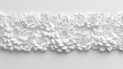   A close-up of a white wall adorned with flowers at the top and base