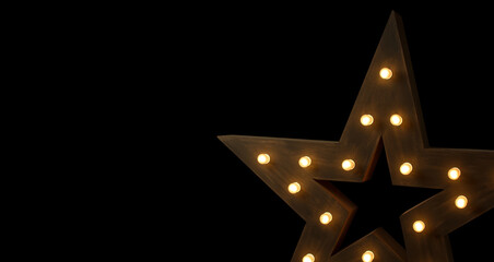 Wooden star with light bulbs on a black background