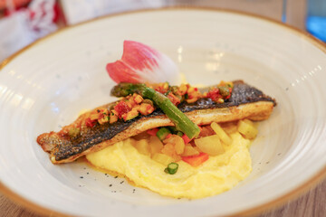 Baked salmon with mash potato and grilled asparagus