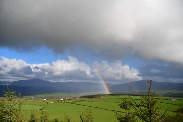 View of rainbow over tne mountains. Coppanagh Hill, Co. Kilkenny, Ireland