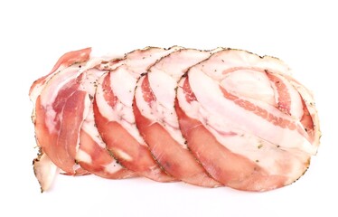 Slices of Guanciale, italian cured meat made from pork jowl, on white background. It is eaten directly, but the main use is as ingredient in pasta dishes.