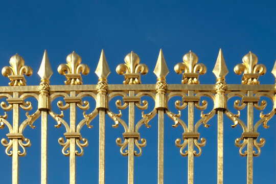 Versailles, France  Palace of Versailles. Gates covered in real gold.