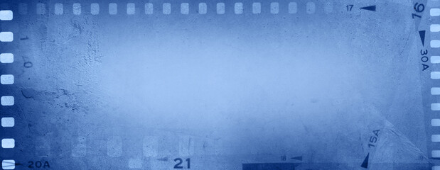 Film negatives blue background - 795571265