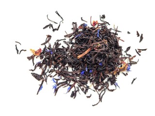 Dried leaves of ceylon tea on a white background.