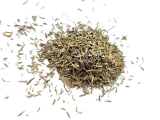 Dried pieces of rosemary on a white background.