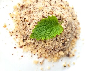 Nuts powder and peppermint leaf.