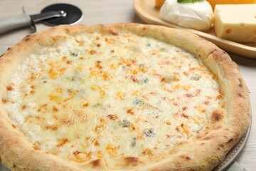 Delicious cheese pizza on table, closeup view
