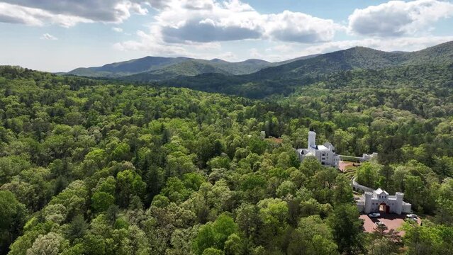 Uhuburg castle in Helen Georgia drone photograph. Smooth aerial drone footage of the Uhuburg castle in Helen Georgia. Footage taken on 4-24-204 in Helen Georgia, U.S.A. Green forest trees and majestic