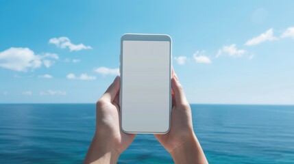 Closeup woman hands holding mobile phone with blank screen against blue sea background. AI generated