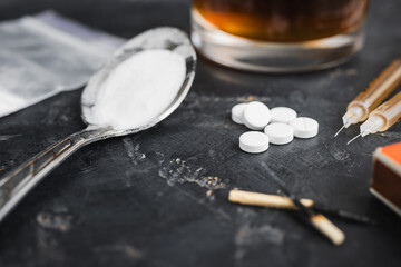 Narcotic substances in spoon, dope powder in transparent plastic bag, syringes with drugs dose,...