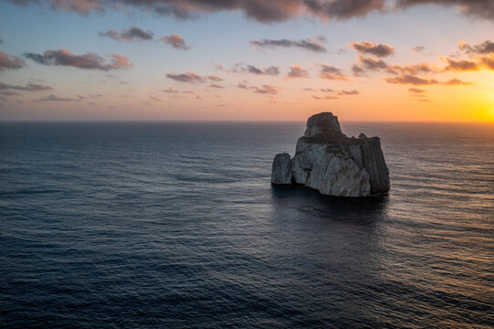 Serene Sunset Over Sardinian Coastal Rock Formation, Pan di Zucchero Island