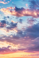 Naklejka na ściany i meble Majestic real sunrise or sundown sky background with gentle colorful clouds in a panoramic, large-scale format