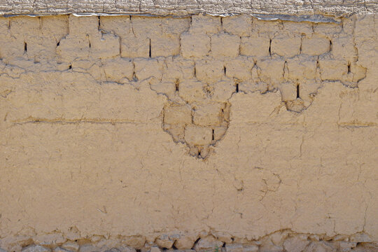 background image of adobe brick wall
