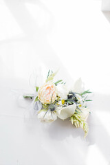 wedding rings and bouquet of flowers