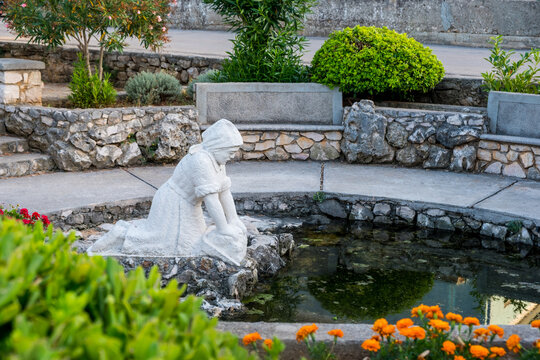 Ugljan Island, Croatia - 18 July 2023 - Monument in Kali on Ugljan Island, Croatia, in memory of laundrywomen that died in a tragic shipwreck on November 2, 1891.