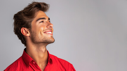Obraz premium Side view candid of caucasian businessman in red shirt smile isolated