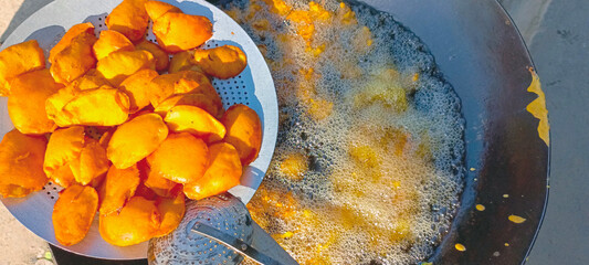 hot potato fritters - Aloo Pakoras Pakistani street food close-up