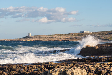 waves crashing on the rocks