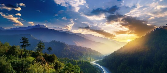 Colorful landscape with high mountains, beautiful river, green forest, blue sky with clouds and yellow sunlight at sunset in summer. Mountain valley. Beautiful high quality nature landscape.