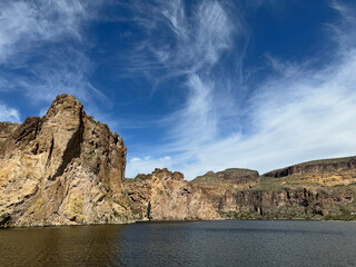 View from a steamboat, of Canyon Lake reservoir and rock formations in Maricopa County, Arizona in the Superstition Wilderness of Tonto National Forest near Apache Trail.  The lake was formed by dammi